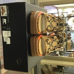 Sorel tan sandal with orange trim